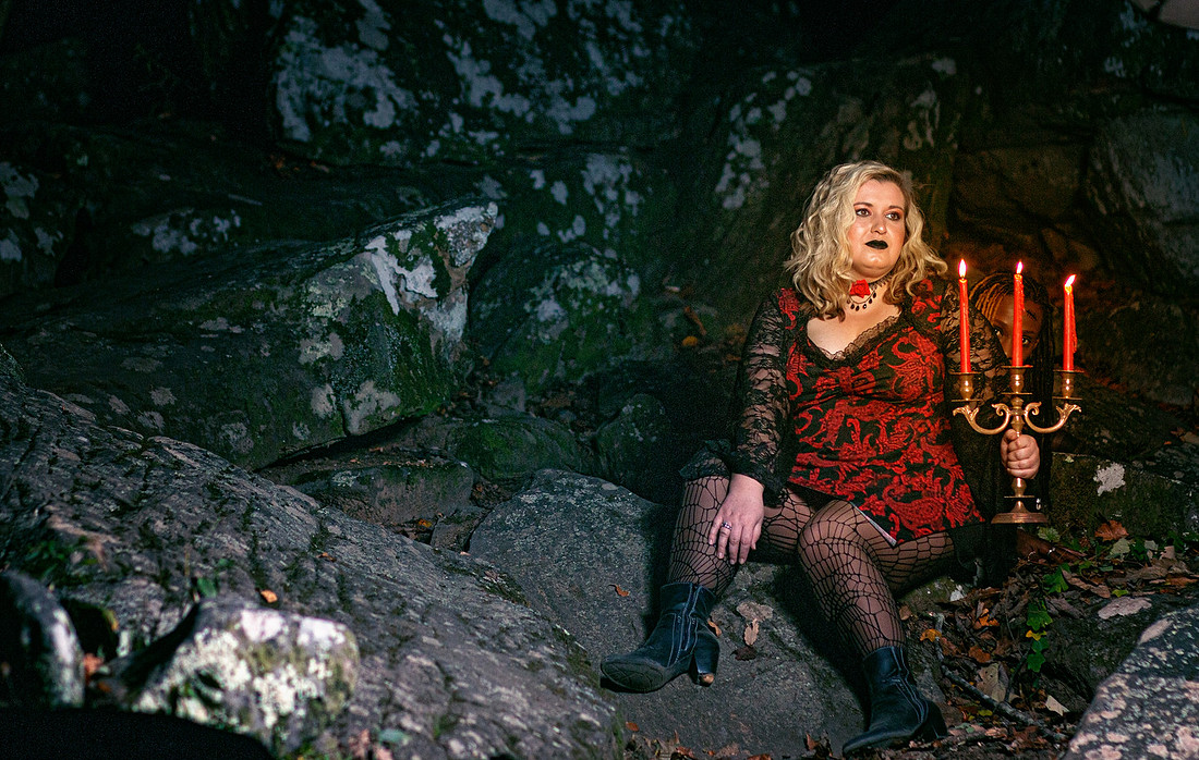 Lady in red moss rock